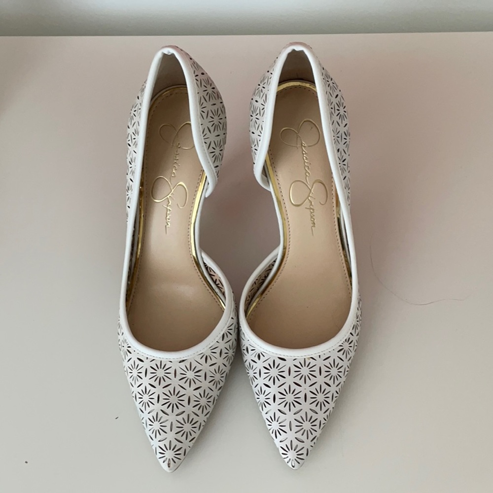 White eyelet pumps